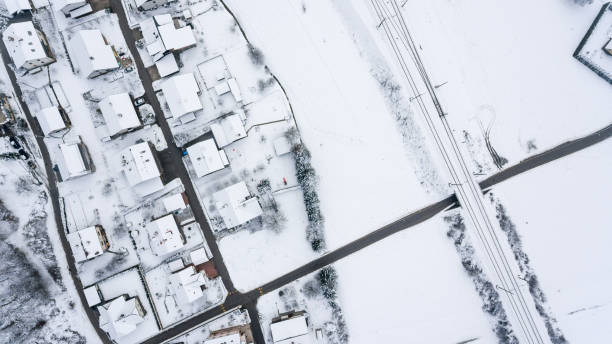 istock Top view of snow covered buildings. 859844234