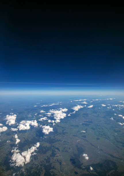 istock High altitude view between sky and space , in to the dark 859853230