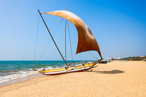 Beauty tourist boat at Negombo beach. Negombo is a major city situated on the west coast of Sri Lanka.
