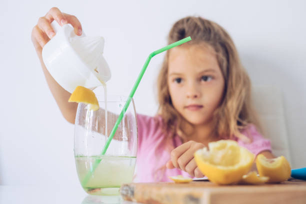 istock Pouring juice in glass 859878912