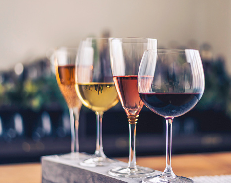 Wine tasting theme with four glasses of wine