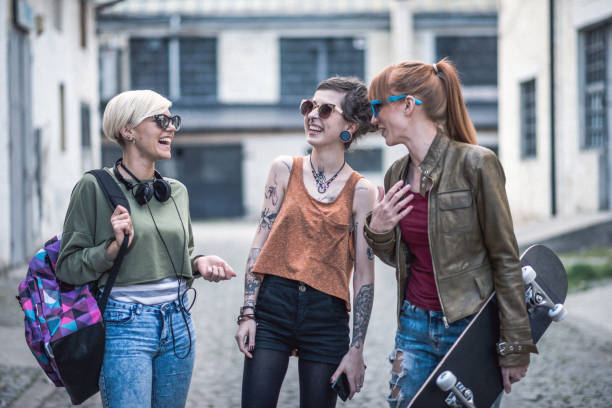 istock Millennial generation women - young women sharing secrets 859882882