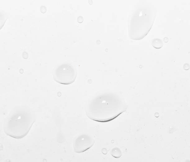 istock drops of water on white. close-up 859886270