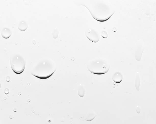 istock drops of water on white. close-up 859886744