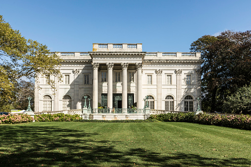 Newport: Exterior view of the historic Marble House in Newport Rhode Island. This former Vanderbilt Mansion is now a well known travel attraction.