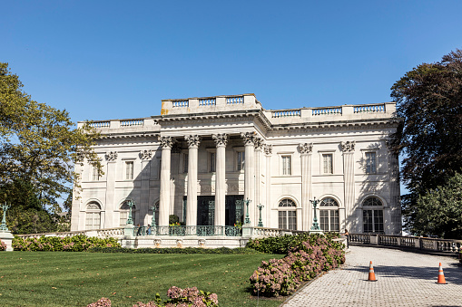 Newport: Exterior view of the historic Marble House in Newport Rhode Island. This former Vanderbilt Mansion is now a well known travel attraction.