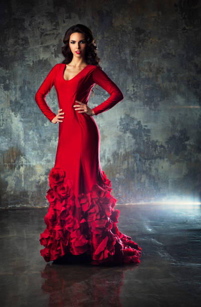istock Young woman in red 859893706