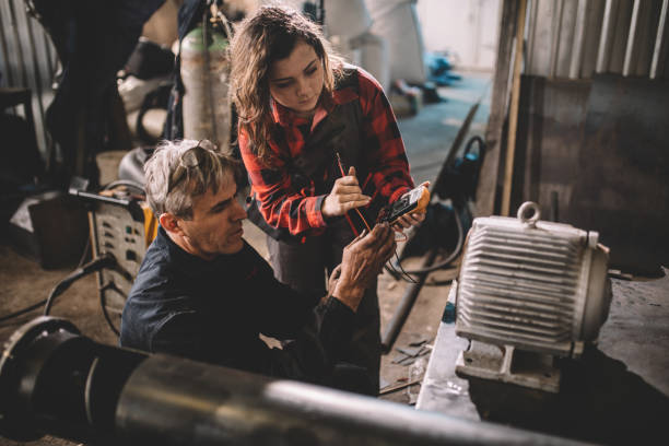 istock Team repairing electric motor 859896832