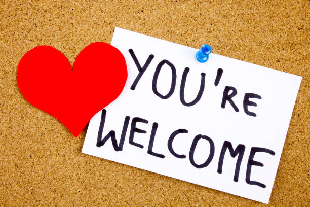 istock A yellow sticky note writing, caption, inscription You are welcome - handwriting in a black ink on cork notice board 859912584