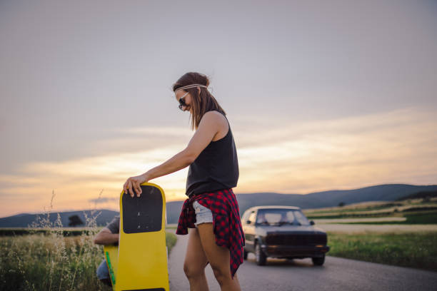 istock Couple skateboarding together 859916330