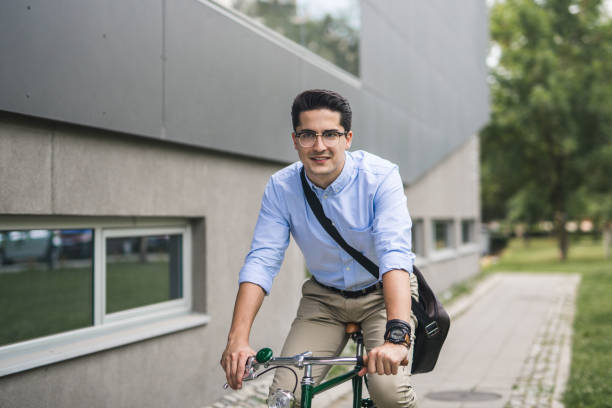 istock Businessman on his bike 859916646
