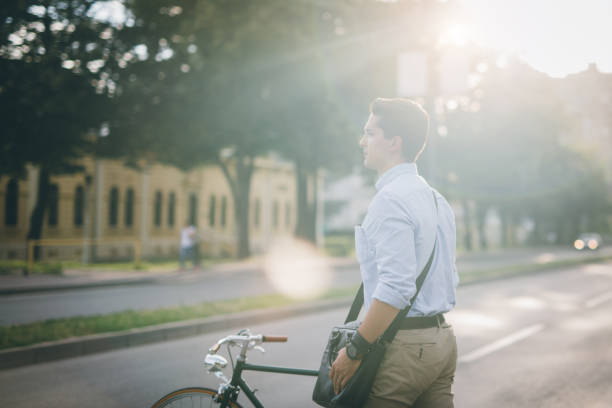 istock Crossing street with a bike 859916882