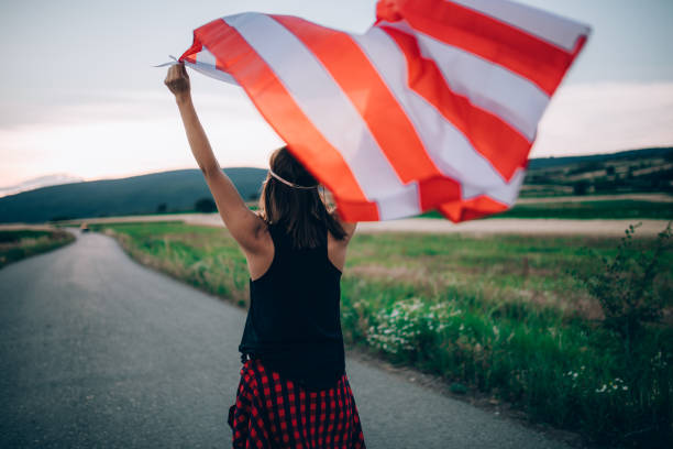 istock Girl with US flag 859917382