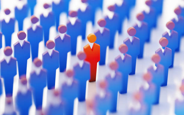 istock Red Man Icon Surrounded By Blue Man Icons Standing Out From The Crowd 859918250