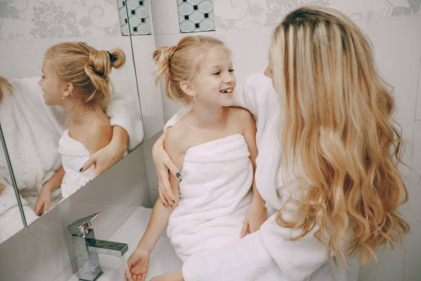 istock family in the bathroom 859925098