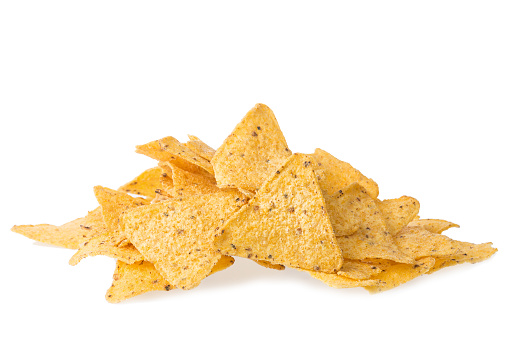 A pile of cheese covered tortilla chips isolated on white background. Nachos mexican cuisine