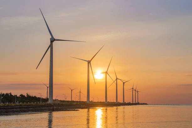 istock Scenic view of wind turbines 859956158
