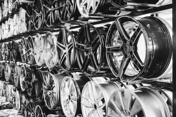istock wall of alloy car wheels in store 859966922