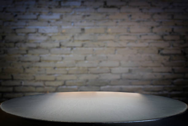 istock Selected focus empty black wooden table and wall texture or old black brick wall blur background image. for your photomontage or product display 859975846