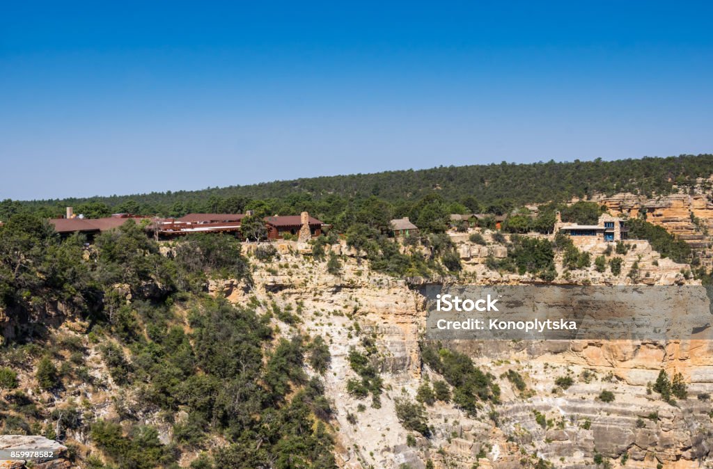 Grand Canyon Village. Tourist center buildings Tourist attraction of Grand Canyon National Park. Buildings Grand Canyon Village on the edge of the cliff. Tourist center in Arizona Accidents and Disasters Stock Photo