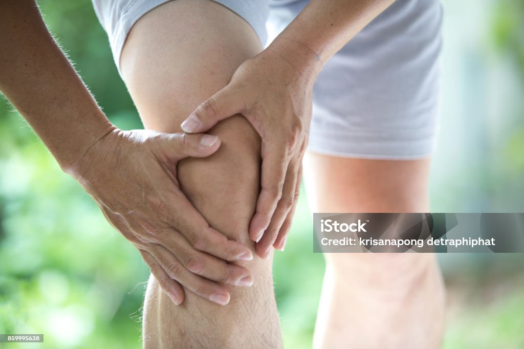 knee ache Osteoarthritis Stock Photo