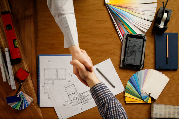 istock Architect and client Job agreed Engineer desk background Project ideas concept 859996760
