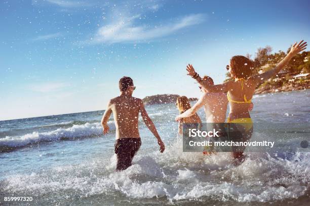Happy Friends Sea Beach Holidays Stock Photo - Download Image Now - Beach, Friendship, Summer