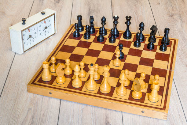 istock Old wooden chess set.  First moves 860007576