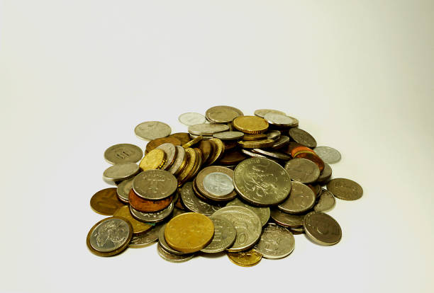 istock Coins of various countries are piled up. 860008570