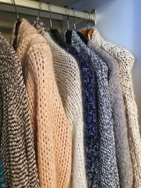 istock Knitted winter cardigans in the wardrobe 860017272