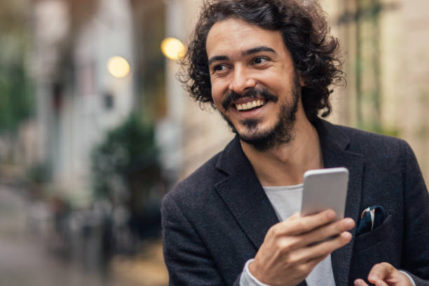 istock Man texting in the city 860021276