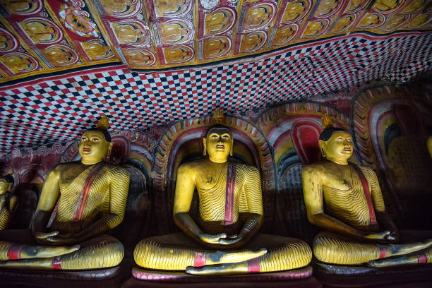 istock Images of meditating Buddha in Dambulla 860025966
