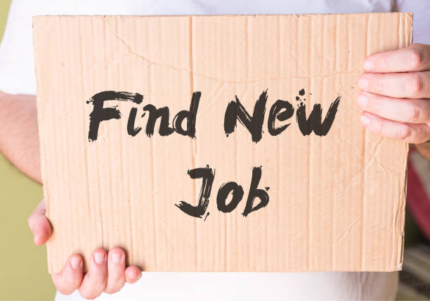 istock Find New Job on cardboard in hands man 860026716