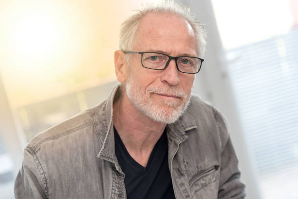 istock Portrait of mature man, light effect 860031692