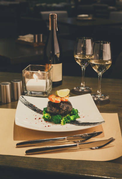 istock Romantic dinner at luxurious restaurant. Dorado fillet in nori w 860032376