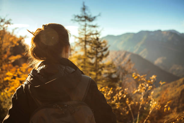 istock Woman backpacker standing and Looking at View 860032474