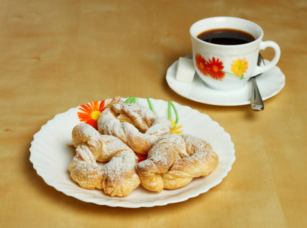 Cookies and a hot Cup of coffee with sugar. stock photo