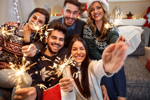 istock Cheerful group of people with sparkles together 860036772
