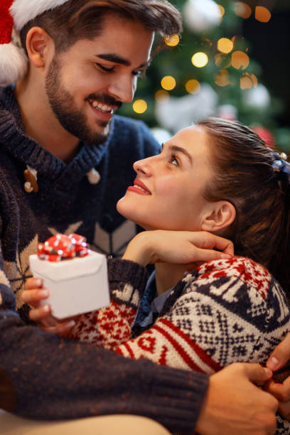 istock Christmas couple enjoying in the holidays 860037284