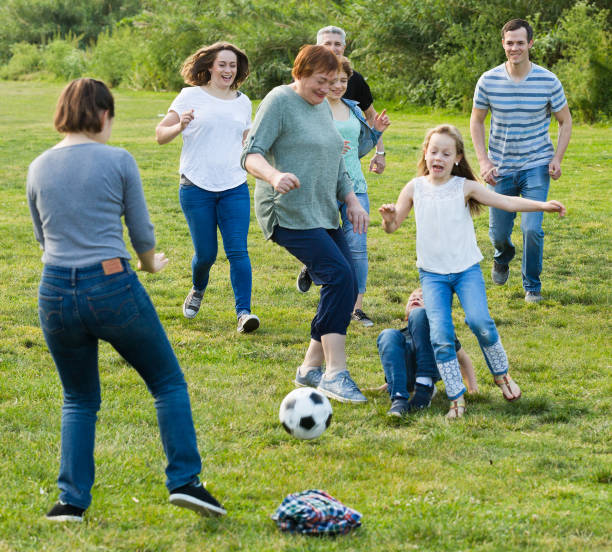 istock people of different ages playing football 860037426