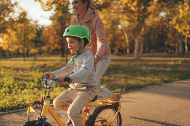 istock Mother and son on a bicycle lane 860038438