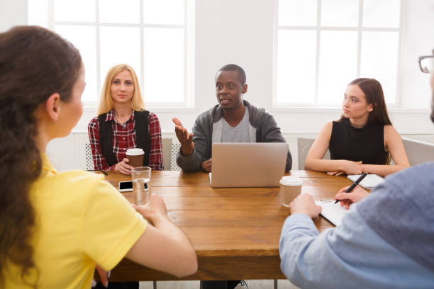istock Business meeting. Young team in modern office 860039872