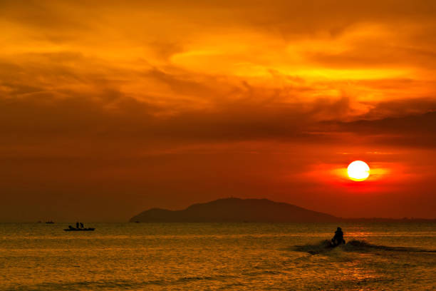 istock Orange sunset in Sanya, Hainan, China. 860041234