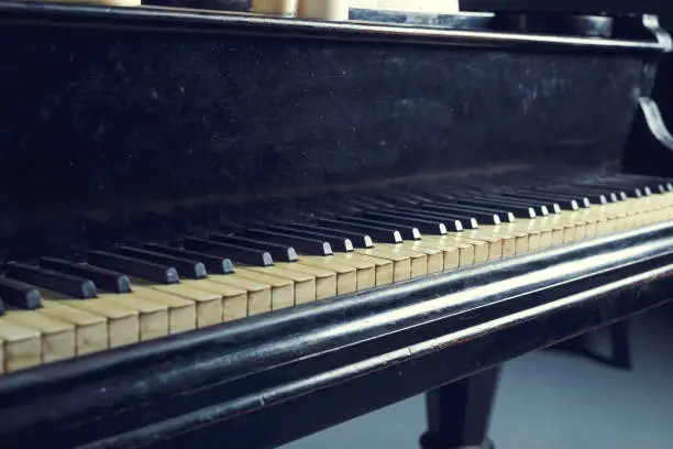 Old piano, keys close up. Vintage filter