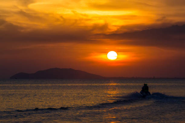 istock Orange sunset in Sanya, Hainan, China. 860044760