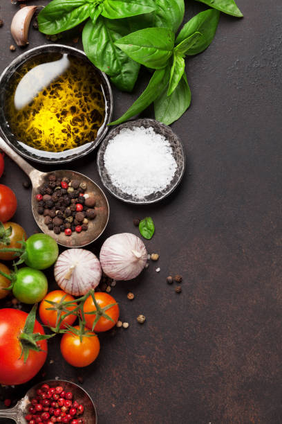 istock Tomatoes, basil, olive oil and spices 860045224