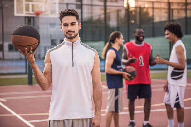 istock Guys playing basketball 860045550