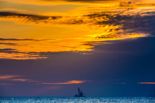 istock Floating oil platform on sea sunset. Hainan, China. 860045822