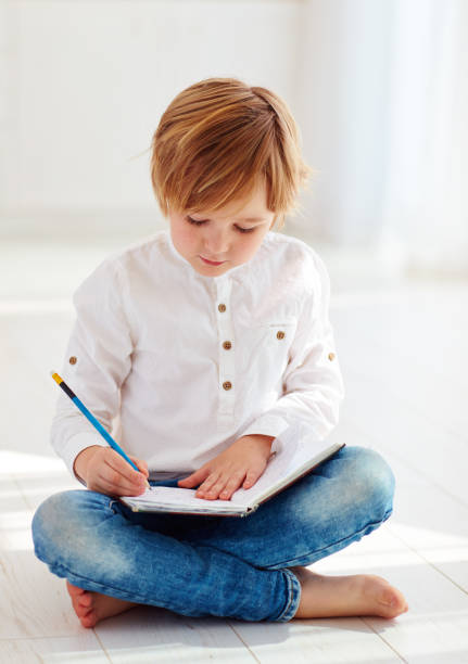 Child Reading From Note 750+ Kids Summer Reading Program Stock Photos, Pictures & Royalty-Free ...