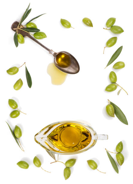 istock Raw olives and olive oil, top view. 860053190